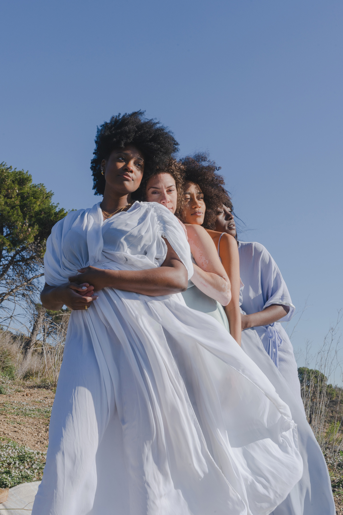 Women Hugging in the Meadow
